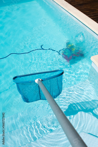Swimming pool cleaning with Pool Skimmer and underwater cleaning robot
