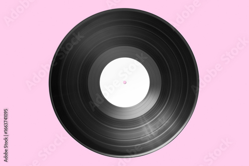 Vinyl record with bank label isolated on pink background. Mock up