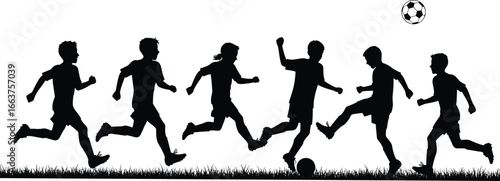 grass field, silhouette figures, kicking ball, running, teamwork, youth, outdoor activity, exercise, fun, energetic moment