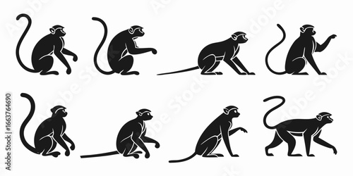 Collection of Stylized Black Monkey Silhouettes in Various Poses