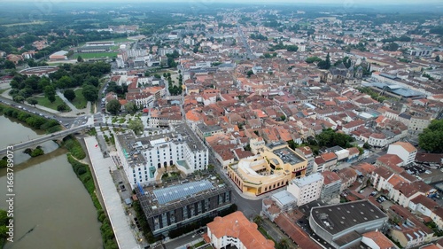 Aerial panorama view around the old town and around the city Dax in France, on a sunny summer afternoon