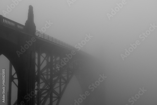 Newport Bridge around noon during a very dense fog.