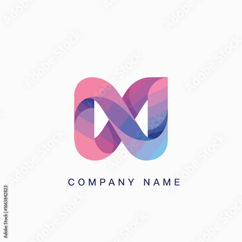Dynamic and abstract logo design featuring a vibrant, multi-color ribbon forming an 'M' or 'N' shape, reminiscent of an infinity symbol