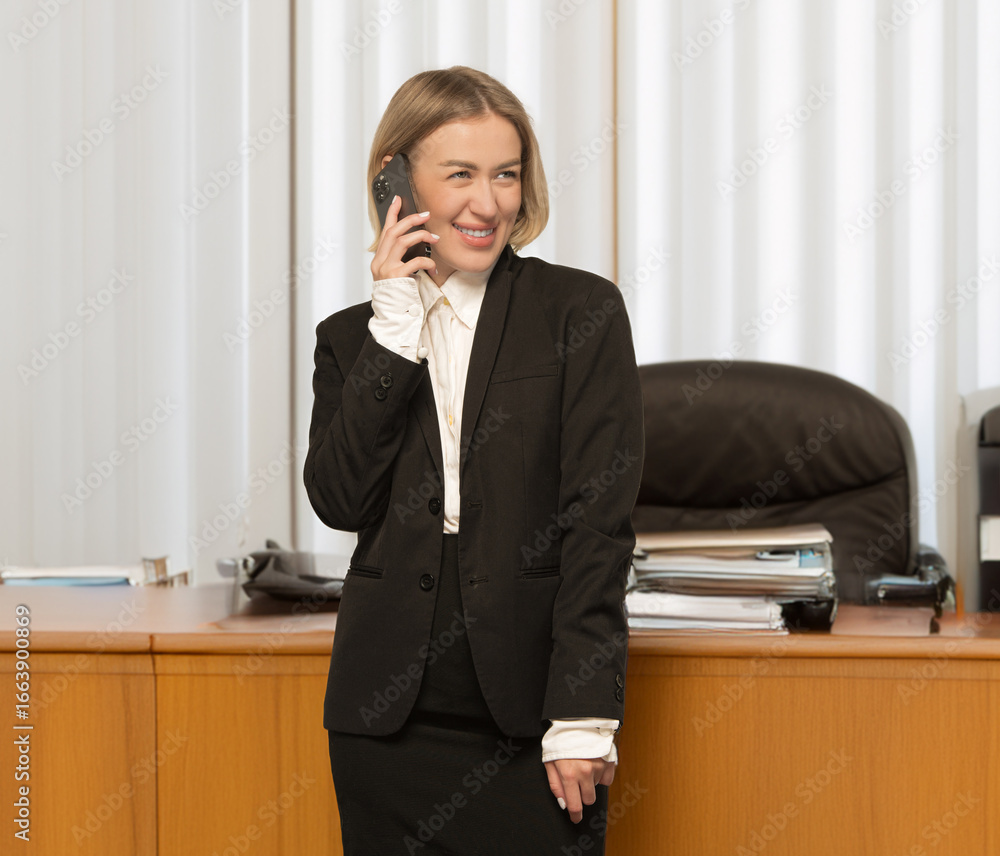 young businesswoman talking on the phone young businesswoman talking on the phone