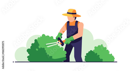 A gardener wearing a straw hat, gloves, and overalls is trimming a green hedge with large shears.