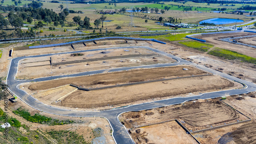 Drone aerial photograph of a construction site in the fast growing suburb of Oran Park in the Macarthur Region of South Western Sydney in New South Wales, Australia. 