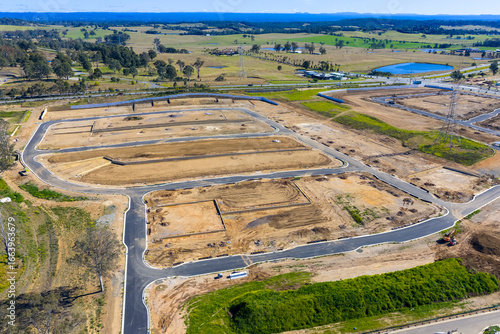 Drone aerial photograph of a construction site in the fast growing suburb of Oran Park in the Macarthur Region of South Western Sydney in New South Wales, Australia. 