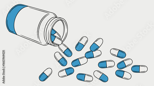 Blue and White Capsules Spilling from a Pharmaceutical Bottle