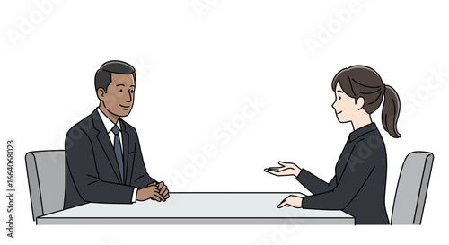 Business Interview: Man and Woman Discussing at Table.