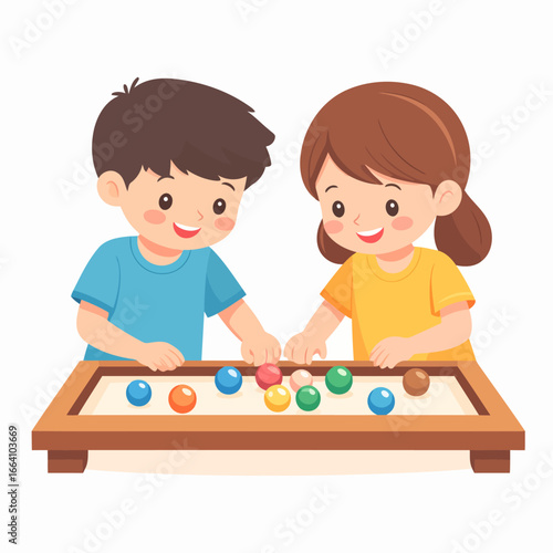 Happy cartoon boy and girl playing together with colorful marbles in a wooden sand tray.