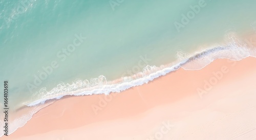 Serene ocean wave gently washing ashore on a sandy beach