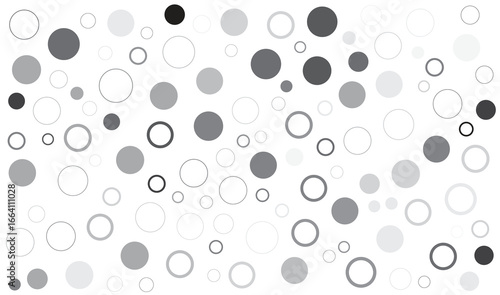 Scattered circles and rings in various shades of gray and white dots 