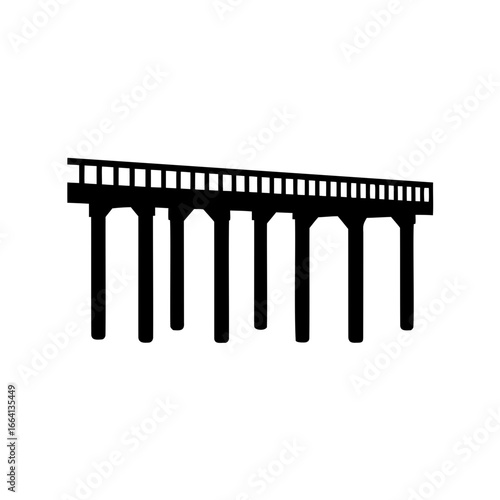 A Long Bridge Silhouette with Many Pillars and an Interconnected Railing