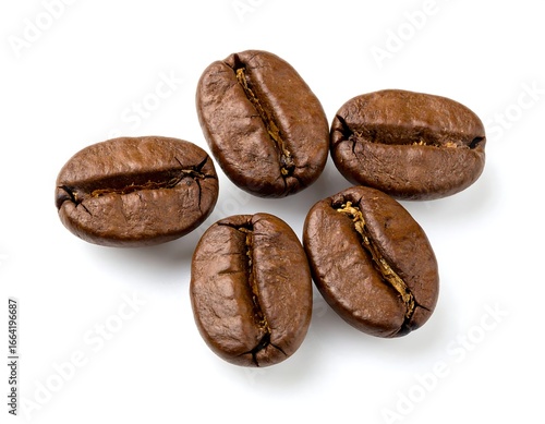 Five roasted coffee beans arranged on a white background (2)