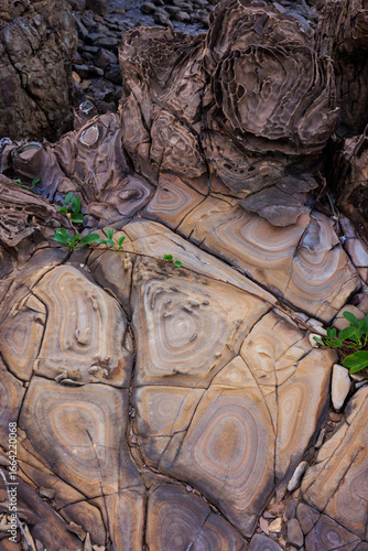 Incredible erosion patterns on rocks along the shore, Thailand