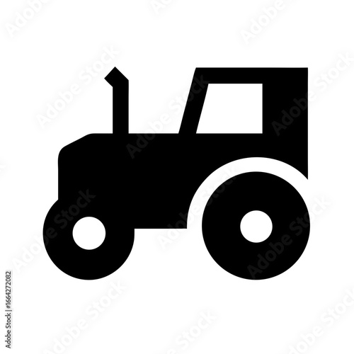Black silhouette of a tractor, a symbol of agriculture and farming