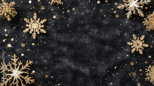 Elegant black background decorated with shimmering gold snowflakes and glitter creating a festive luxury holiday atmosphere