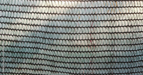Close-up of greenhouse shading net pattern