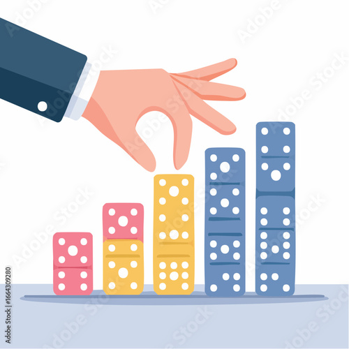 Hand Placing Dominoes Representing Business Growth