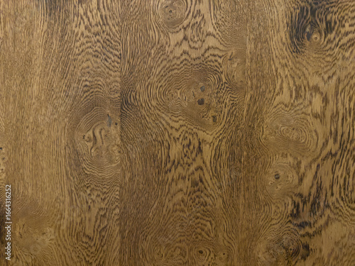 Exquisite Hardwood Close-Up: Rich Brown Wood Grain with Natural Swirls and Patterns