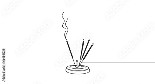 Incense sticks burning, creating a calming and aromatic atmosphere.