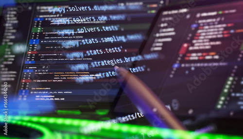 programming setup showing Python scripts and highlighted functions, representing software development, debugging, and code analysis.