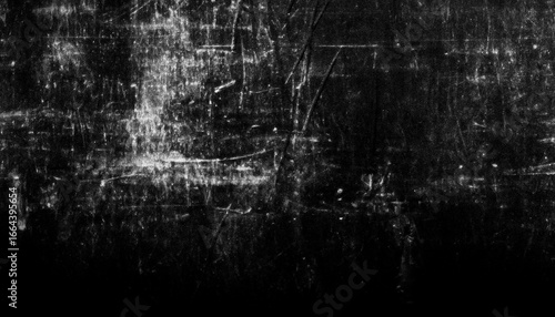 Black grunge texture background with scratches and distressed surface effect