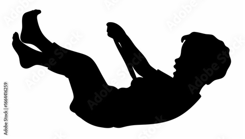 Silhouette of a child on a swing set with legs raised and head tilted back in a playful moment of joy