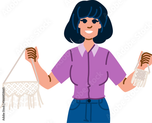 Woman showing two handmade macrame bags with fringes and geometric pattern