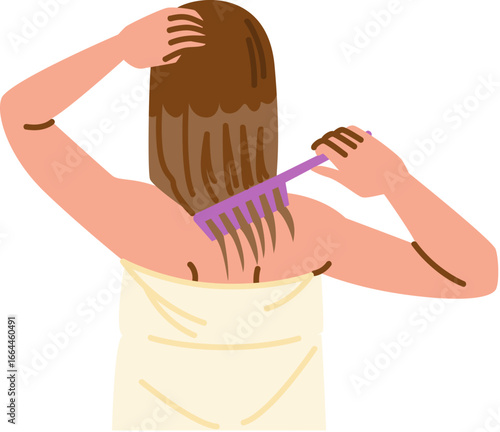 Woman brushing long hair after shower with towel wrapped around body