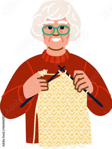 Smiling senior woman knitting warm clothes with needles and yarn