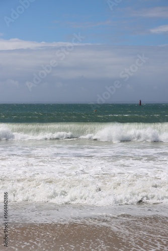 waves rolling on the beach in Quiberon , France
