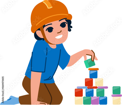 Little builder kneeling and stacking colorful toy blocks wearing an orange helmet