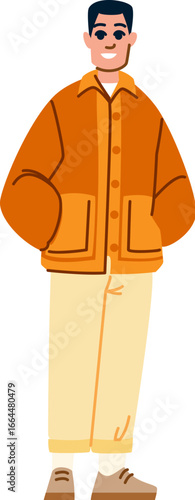 Young man wearing casual clothing is smiling with hands in pockets