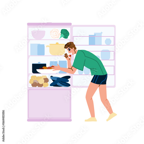 Hungry man searching food in refrigerator at night