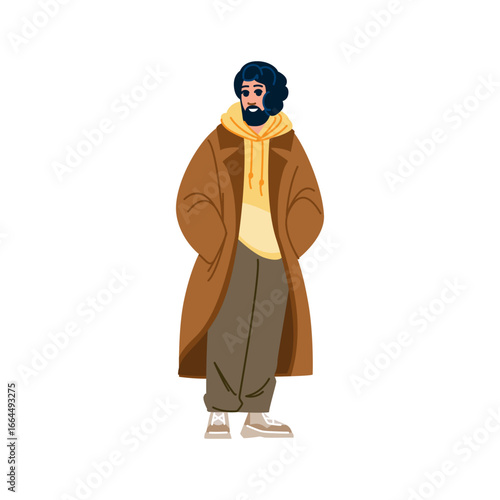 Stylish man posing with hands in pockets wearing trendy overcoat and hoodie