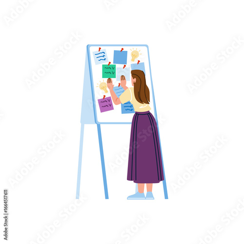Businesswoman planning project, arranging sticky notes on whiteboard