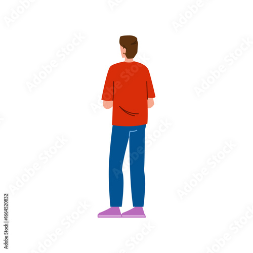 Young man standing with his back turned and looking away