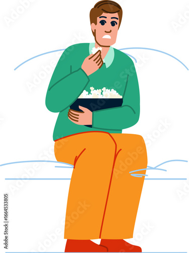 Shocked man watching tv and eating popcorn on sofa