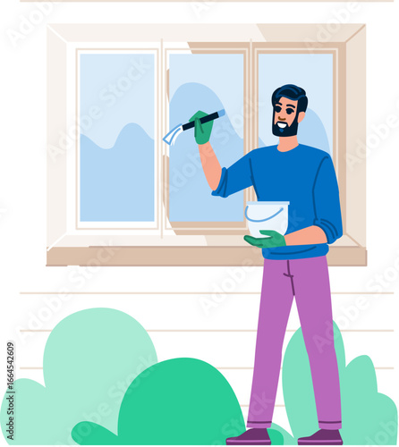 Painter holding paint bucket and painting window frame with brush