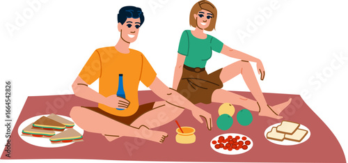 Couple enjoying picnic with food and drinks on blanket