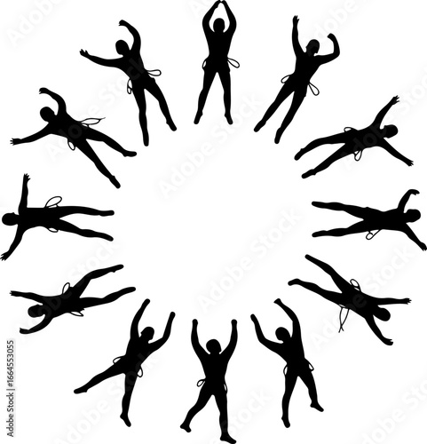 Silhouettes of Rock Climbers in Action"