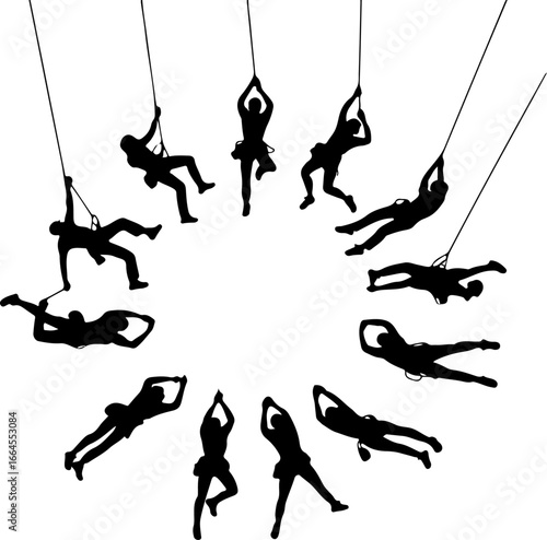 Silhouettes of Rock Climbers in Action"