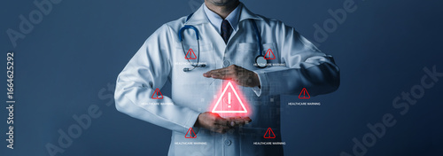 Doctor holding virtual healthcare warning icon. Medical risk alert, notification patient safety issue, emergency care or system failure in digital health technology. Doctor monitoring patient 24 hour.