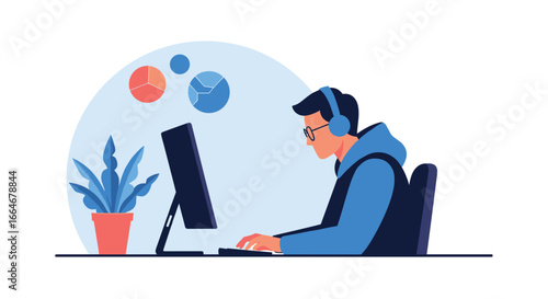 Young person wearing headphones and glasses working on a computer with a plant on the desk