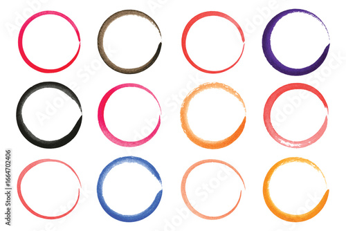 A grid of twelve painted watercolor circles on white. The circles are in various colors and have a textured, handmade look. An artistic arrangement of paint colors.