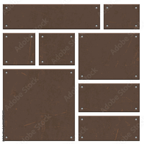 A collection of differently sized, rusty metal panels arranged together on a white background. Each panel has a textured surface with scratches, attached by studs in each corner.