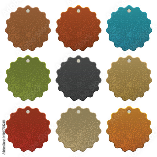 A set of nine round, scalloped-edge tags displayed on a white background. Each tag features a unique color and a textured finish, with a small hole at the top.