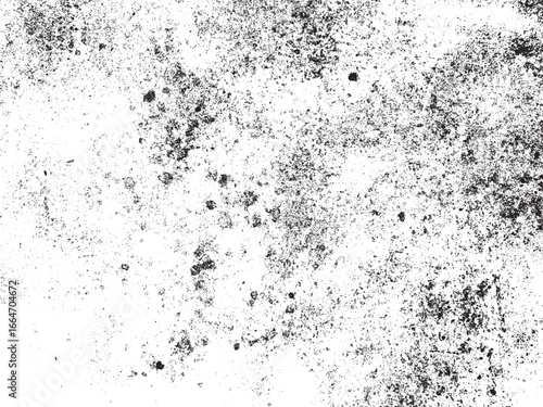 A gritty black and white grunge texture with a weathered and distressed appearance. Speckles and stains create a unique backdrop. Use for design or overlay.