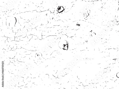 A white surface is textured with cracks and peeling paint, hinting at wear and age. The background is simple, highlighting the surface details.